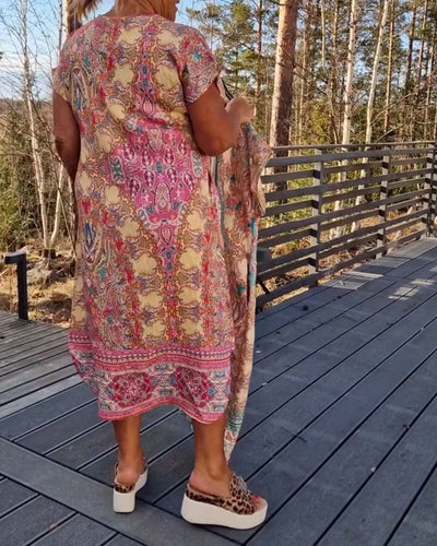 Klänning V-Ringad Kortärmad Mönstrad Rak